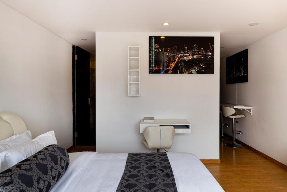 Apartasuite Edificio Monir *
