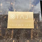 Taj97