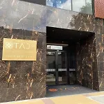 Taj97