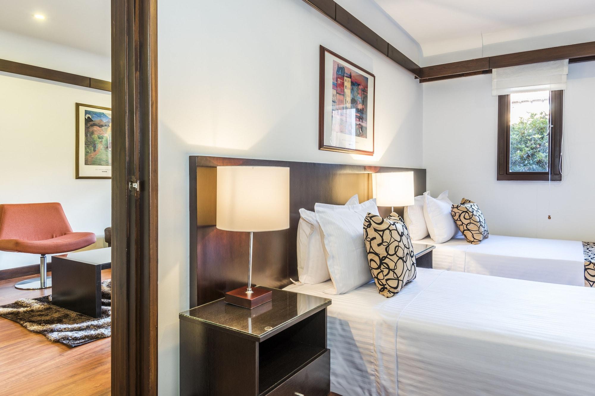 Hotel Travelers Y Condominioplenitud
