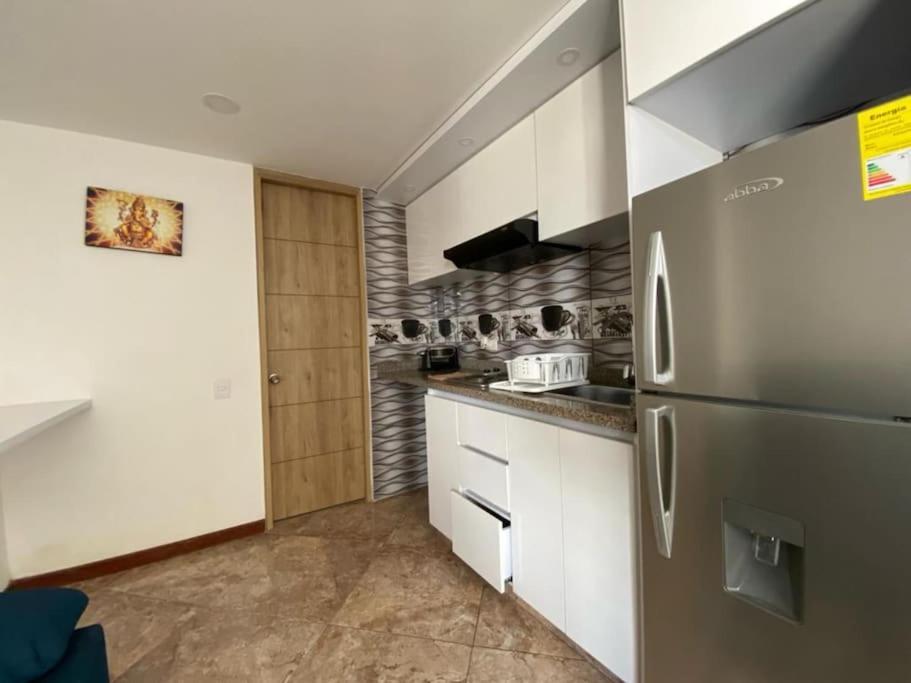 En El Centro Turistico De Con Vista Urbana Apartamento