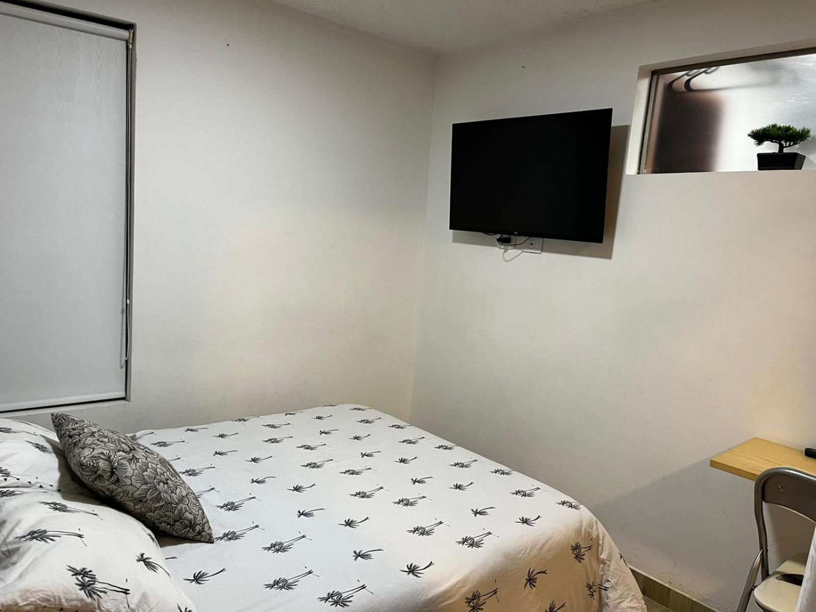 Apartamento Apartasuites 53 Cerca Al Aeropuerto 01