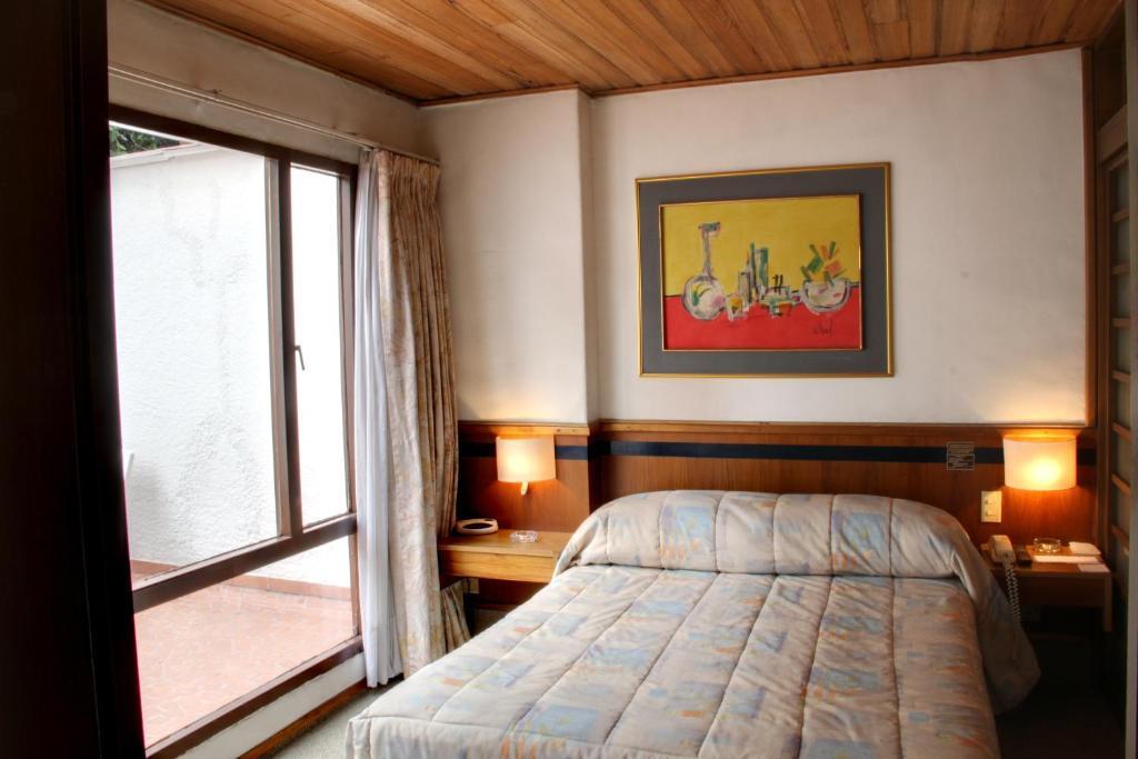 Real 85 Apartahotel